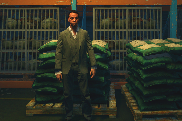 Jack Feebs standing in front of stacked pallets at a farm supply yard