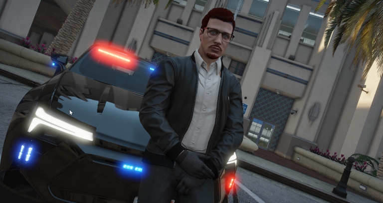 Det. Leo Finn standing in front of an unmarked police car